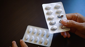 Close-up of a packet of white pills