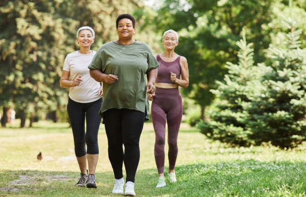 Three ladies jogging outside