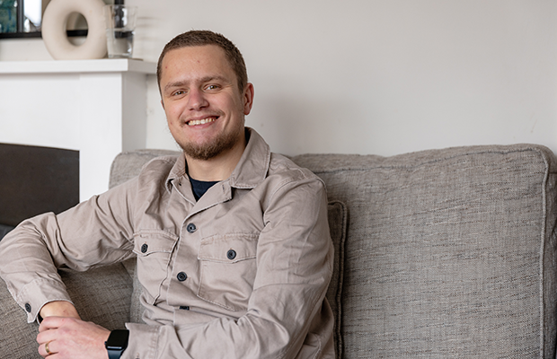 Joe Baxter sitting on the sofa