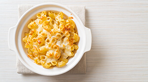 Macaroni and cheese in a white bowl