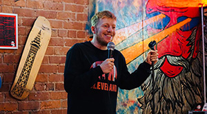 Kieran Cooper performing stand-up comedy