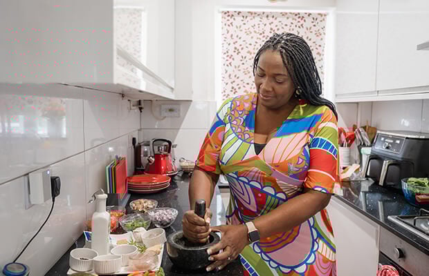 Joyce uses a mortar and pestle in her kitchen