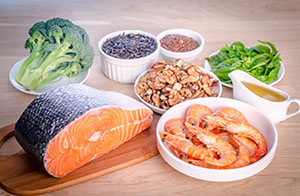 Salmon, seafood, nuts and flax seeds all are good sources of omega 3s