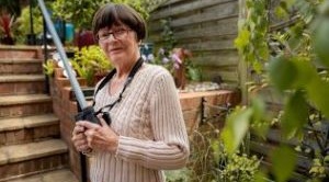 Dot Addley in her garden at home in Kent.