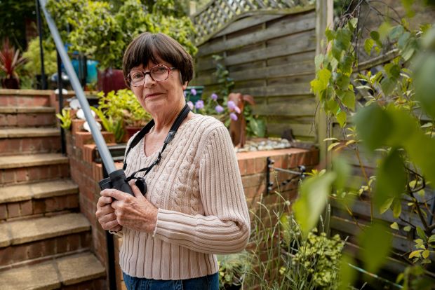 Dot Addley in her garden at home, in Kent.