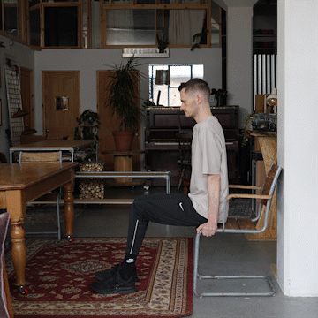 Jack Heseltine demonstrates chair dips
