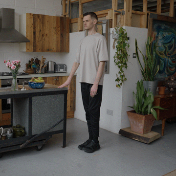 Jack Heseltine demonstrates standing side leg lifts