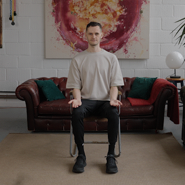 Jack Heseltine demonstrates seated biceps curls