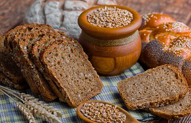 Slices of wholegrain bread on a table.