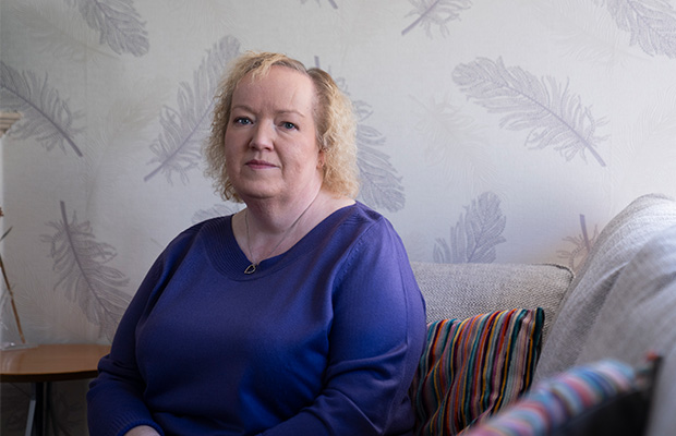 Nicola Topping sitting inside.