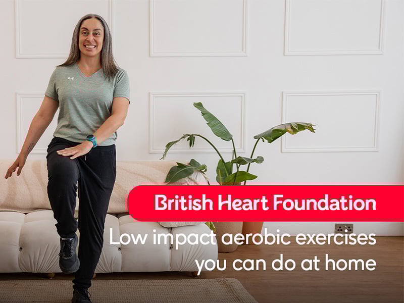 Hara performing a knee raise with a hand tap with the text "Low impact aerobic exercises you can do at home".