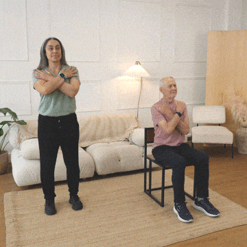 Hara and Peter performing spinal rotation stretch.