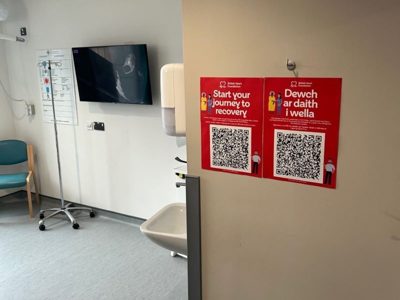 Cardiac rehab poster shown in situ in a healthcare setting in Wales.
