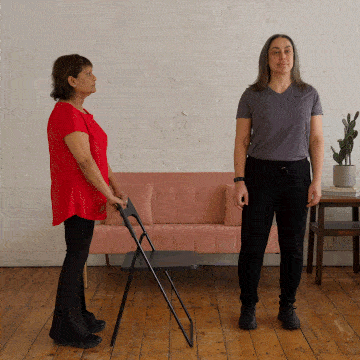 Corinne and Hara demonstrating a single leg stance.