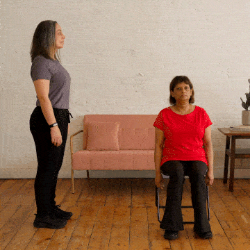 Hara and Corinne demonstrating knee raises.