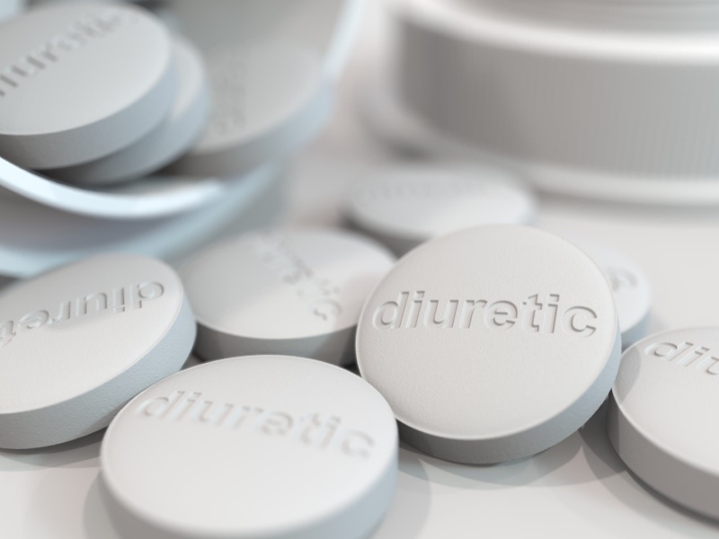White pills with "diuretic" written on them.