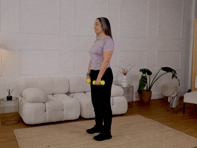 Hara performing a deadlift with weights.