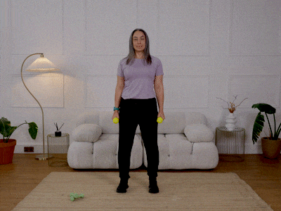 Hara performing a squat with weights.