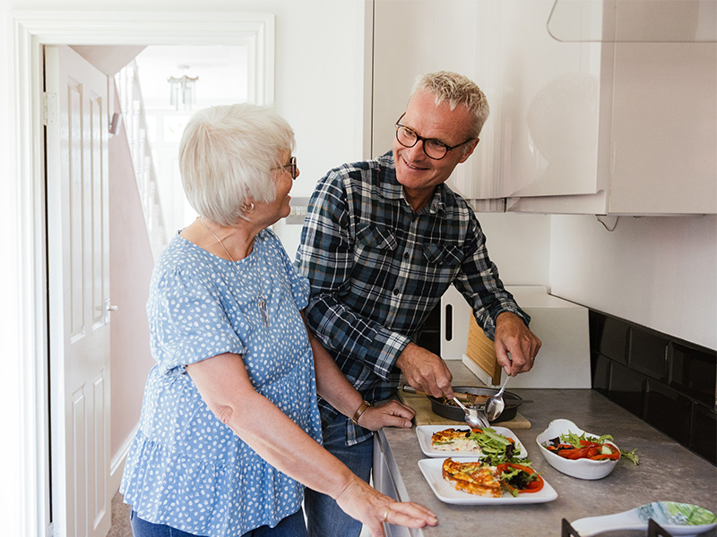 Nigel cooking with his wife Christine