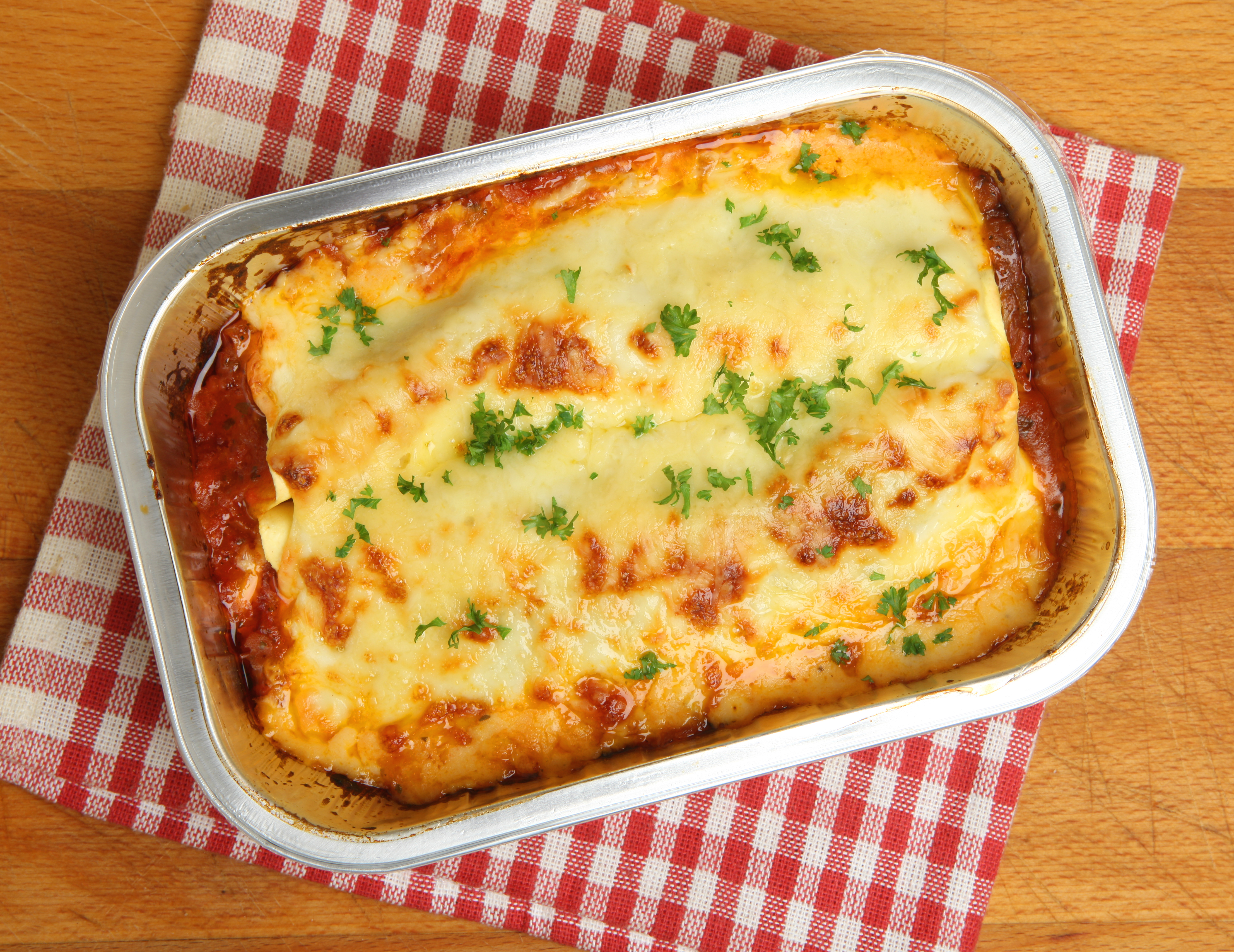 Shop-bought lasagne in tin tray