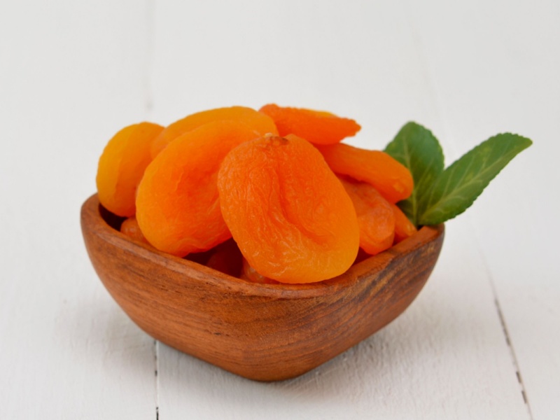 Dried apricots in a bowl.