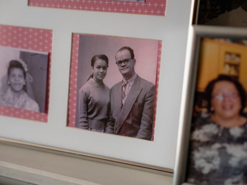Close up of a photo frame with a photograph of Marion Blake and her father when she was 13.