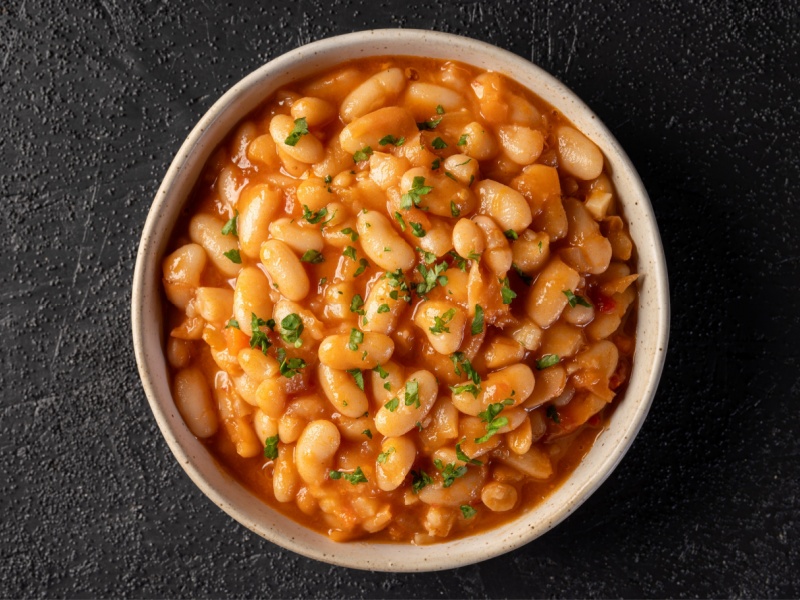 A bowl of baked beans from above.