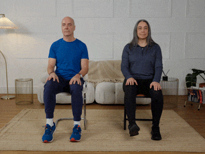 Hara and Robert performing ankle points and ankle rolls.