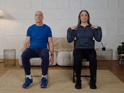 Hara and Robert performing shoulder rolls.