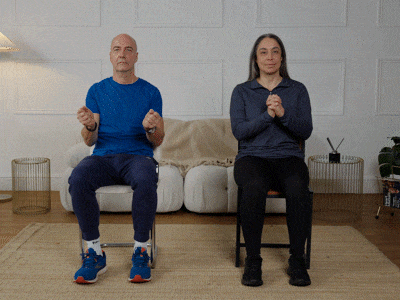 Hara and Robert performing wrist circles.