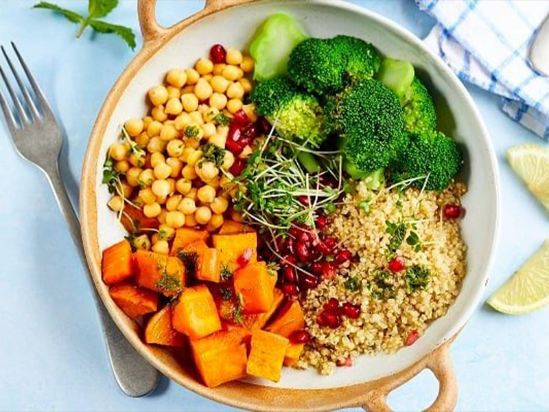Sweet potato buddha bowl presented on a table