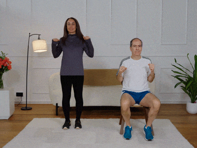 Hara and Stefano performing knee raises with alternating punches.