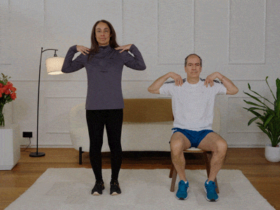Hara and Stefano marching while performing shoulder circles.