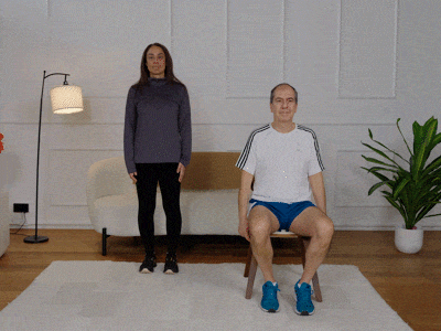 Hara and Stefano performing side taps with alternating side raises.