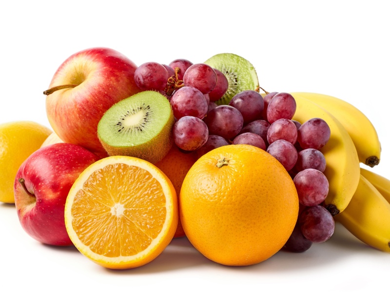A selection of fresh fruits including oranges, apples, red grapes, kiwis and bananas.