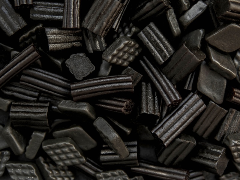 Close up of lots of liquorice sweets.
