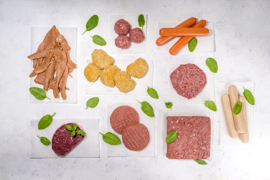 Various plant-based meat alternatives, including sausages, burgers and nuggets.