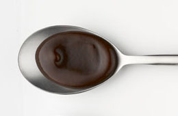 Brown sauce on a spoon