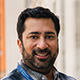 Headshot of Dr Rikesh Rajani.