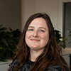 Headshot of Dr Phoebe Kitscha in an office.