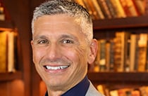 A headshot of Professor Chico.