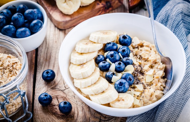 Whole grain cereal porridge with blueberries