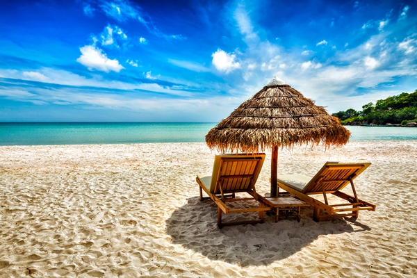 A beautiful beach and two sunloungers