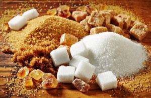 Different types of sugar including white, brown, cubes and crystallised sugar