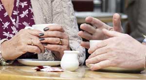 Two people having a cup of tea