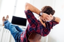 A man sitting in a relaxed position