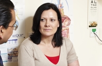 A patient listening to her GP doctor 