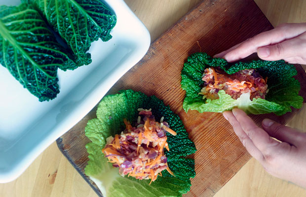 Folding in sides of leaf to form a tight parcel
