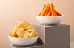 Carrots and crisps in bowls