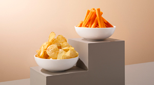 Carrots and crisps in bowls